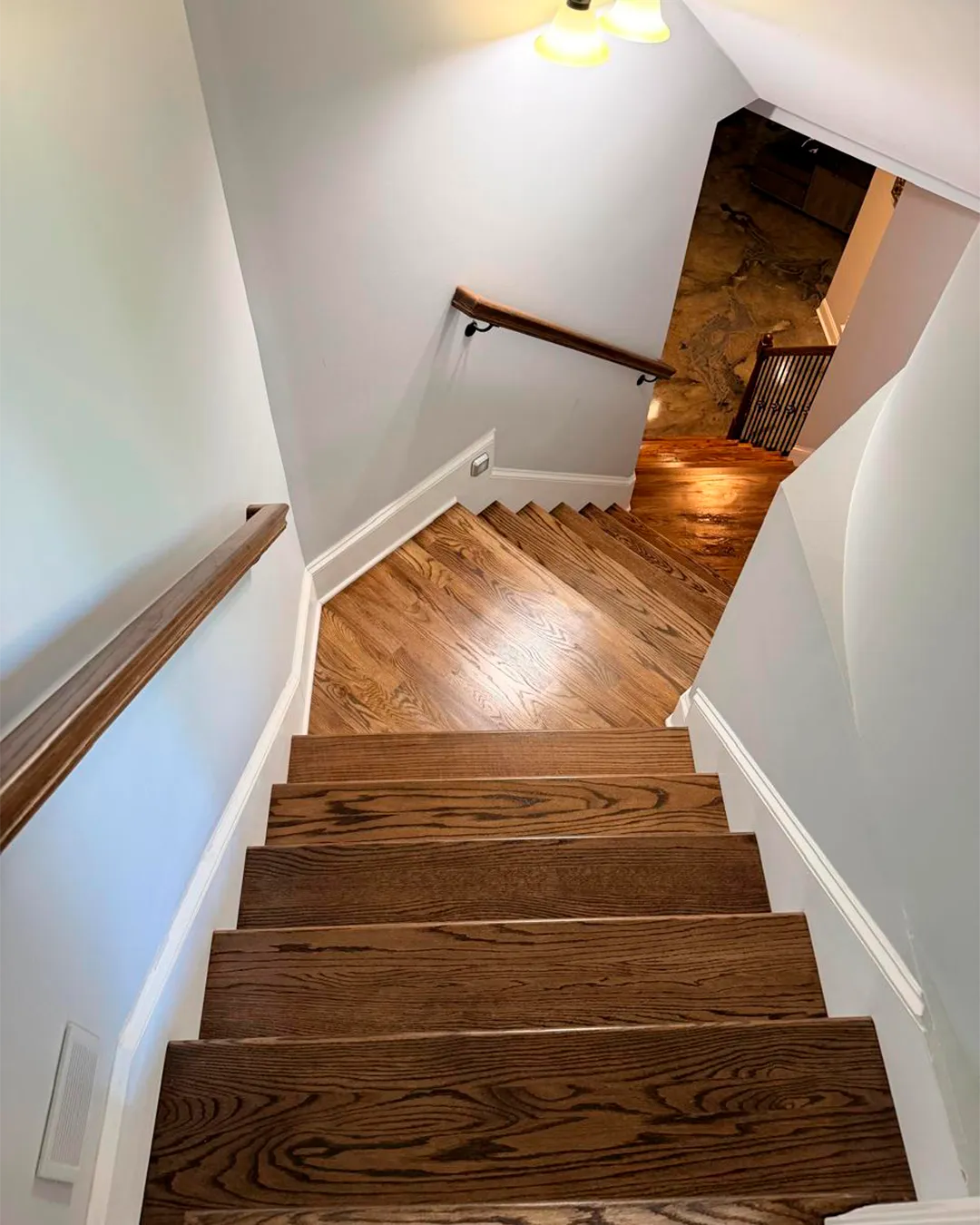 Dark hardwood staircase after refinishing
