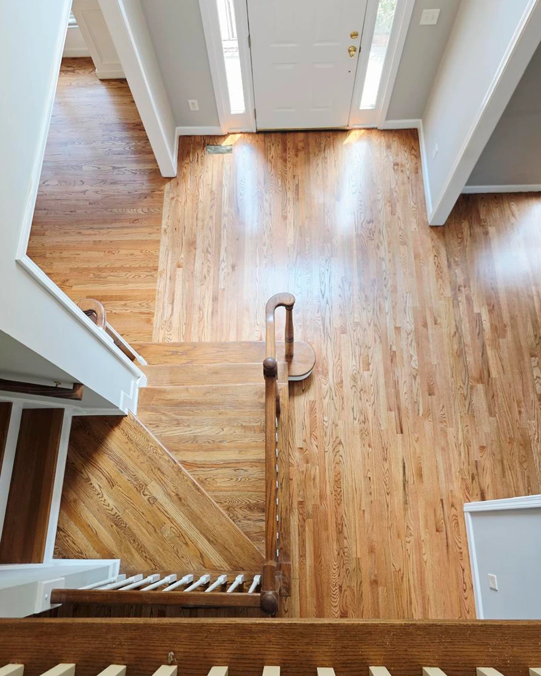Hardwood flooring across an open-concept home