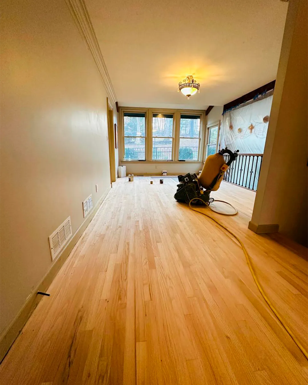 Light hardwood installed through a hallway