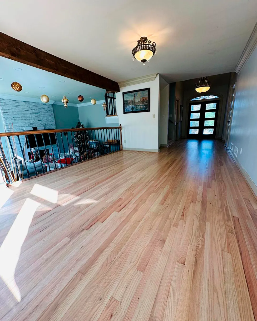 Natural hardwood flooring in a home entryway